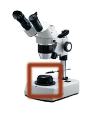 Stereo microscope with darkfield kit attached.