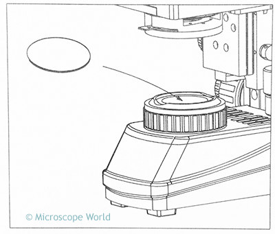 Microscope field iris and filter slot.
